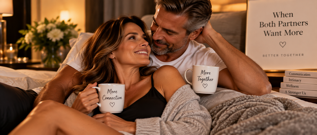 Mature couple smiling affectionately while relaxing together with coffee in a warmly lit bedroom